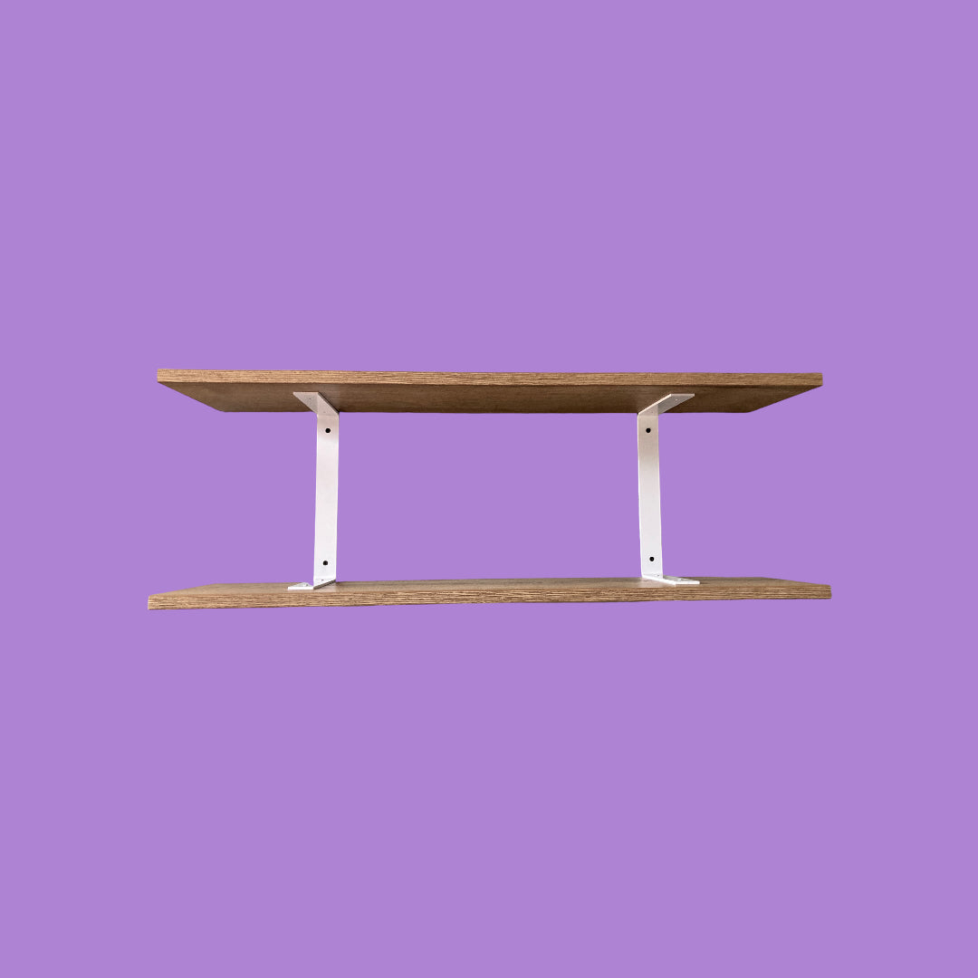 Tobacco oak wall shelf with matte white brackets.