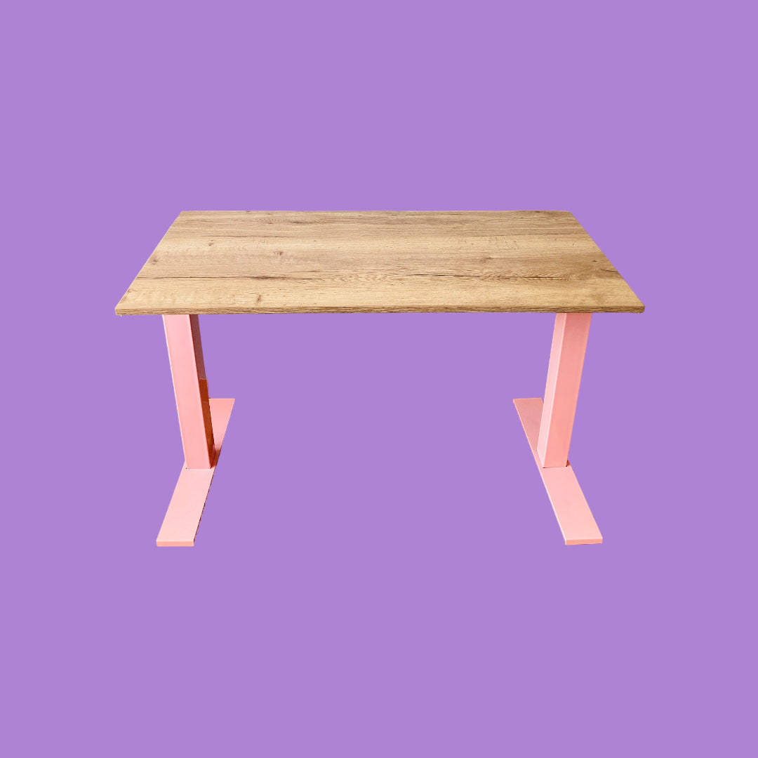 Tobacco oak desk with a pink frame.