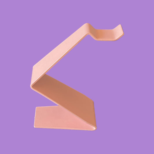 Pink headphone stand.